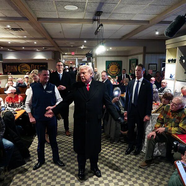 President Donald Trump receives prayer from Iowa restaurant patron