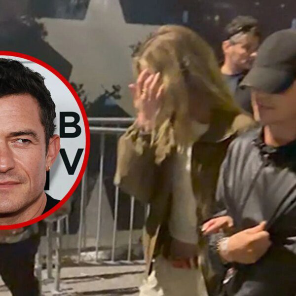 Orlando Bloom Exits Super Bowl Arm-in-Arm With Swiss Model Luisa Laemmel