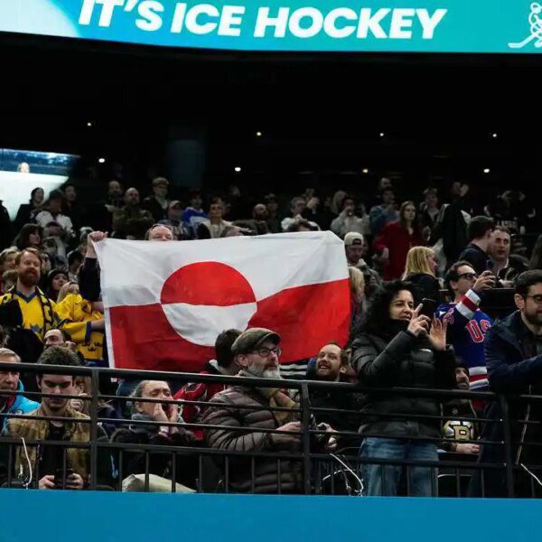 Fans elevate Greenland’s flag to protest US Olympic hockey win over Denmark