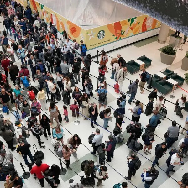 ICE brokers known as in to assist ease airport safety traces might…