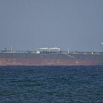 Three oil supertankers sail via the Strait of Hormuz