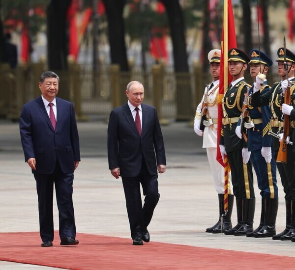 Days After Hosting Trump, Xi Deepens Ties With Putin