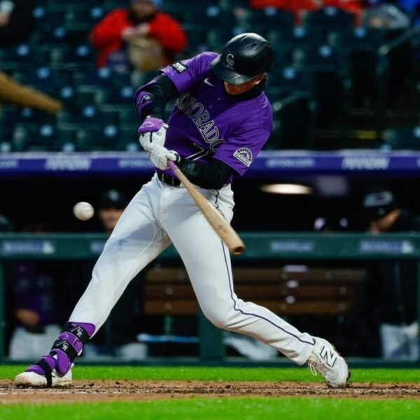 Rockies grasp on to beat Rangers