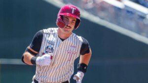 Cinderella Troy rallies for 12-8 win, knocks Ole Miss out of MCWS