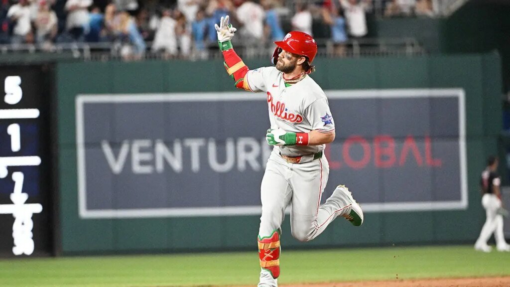 Bryce Harper responds to vulgar chants from National followers with a house run and a gesture throughout his trot
