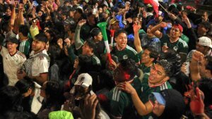 Fan celebrates Mexico advancing within the World Cup by dunking his head right into a cotton sweet machine