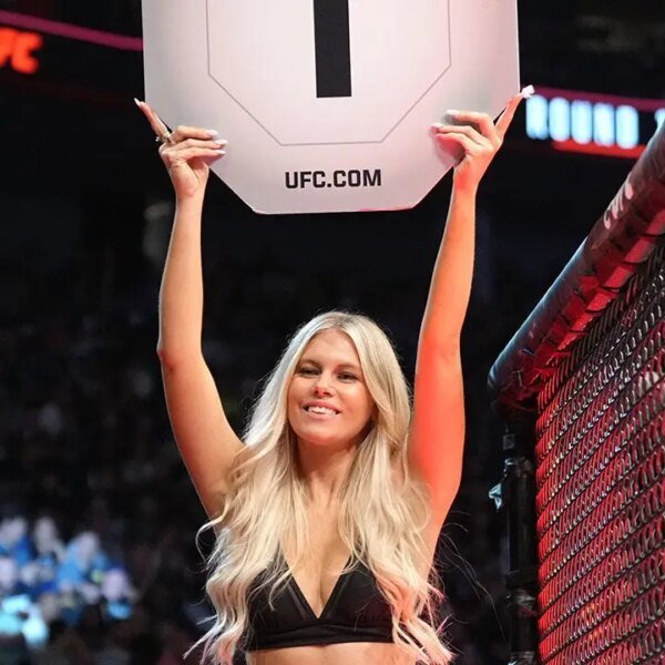 UFC Octagon Girls get coated in pink, white and blue forward of…
