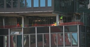 As Workers Shore Up Midtown Building, Developer Reassures Investors