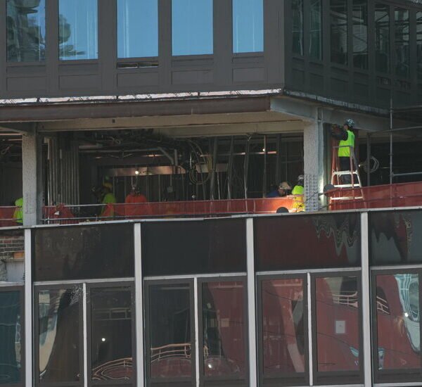 As Workers Shore Up Midtown Building, Developer Reassures Investors