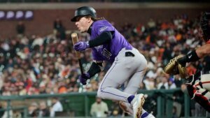 Rockies awaken in ninth, rally previous Giants