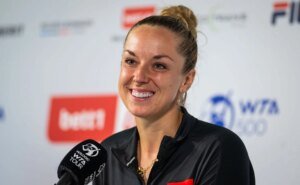PICTURES: Sabine Lisicki poses in pink bikini as she enjoys pool plunge to beat the new summer time