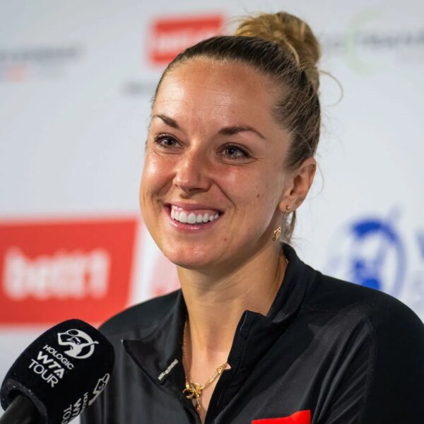 PICTURES: Sabine Lisicki poses in pink bikini as she enjoys pool plunge&hellip;