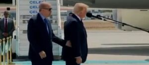 Trump Is So Out Of It At The NATO Summit That He Is Being Guided Around By Hand