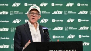 Jets’ Woody Johnson buys minority stake in Aston Martin F1 group