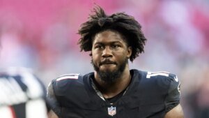 Falcons DE Jalon Walker carted off with leg harm