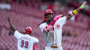 Reds full sweep of Athletics with homers, plate self-discipline