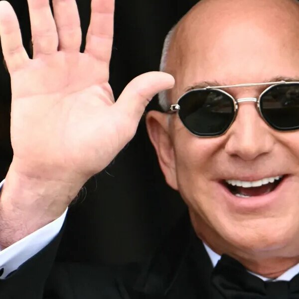 Jeff Bezos needs the underside half of earners to pay zero earnings…