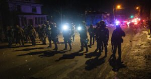 Federal Prosecutors Charge ICE Agent With Lying About Minnesota Shooting