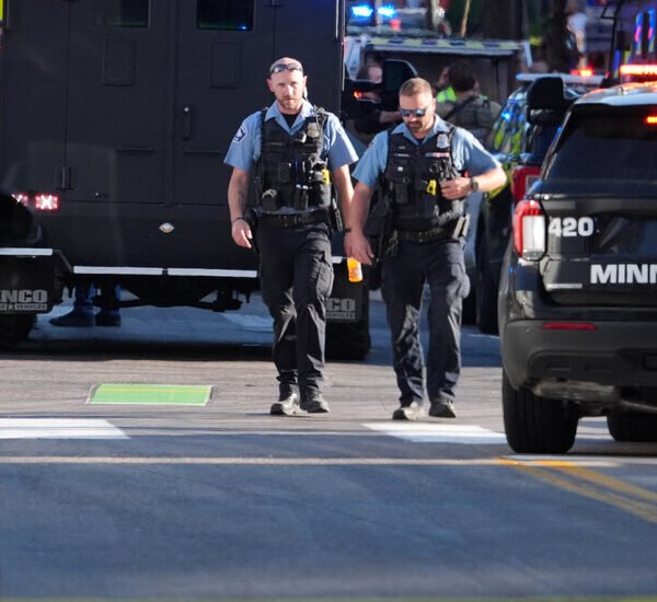 2 People Are Killed and a couple of Officers Are Hurt in…