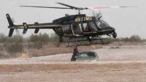 Arizona sheriff’s helicopter rescue saves 2 folks in flooded automotive