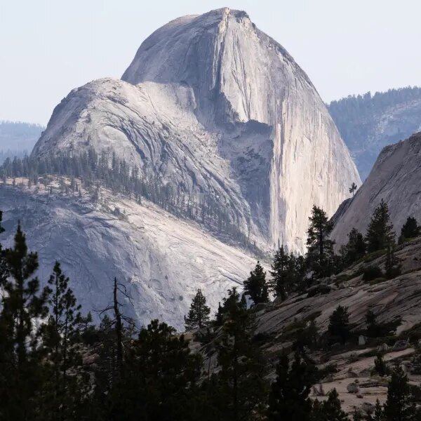 As wildfires and floods hit nationwide parks, a developer says it’s in…