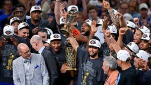 New York Knicks journey on opening night time with T-shirt flub as they dangle first banner in 53 years